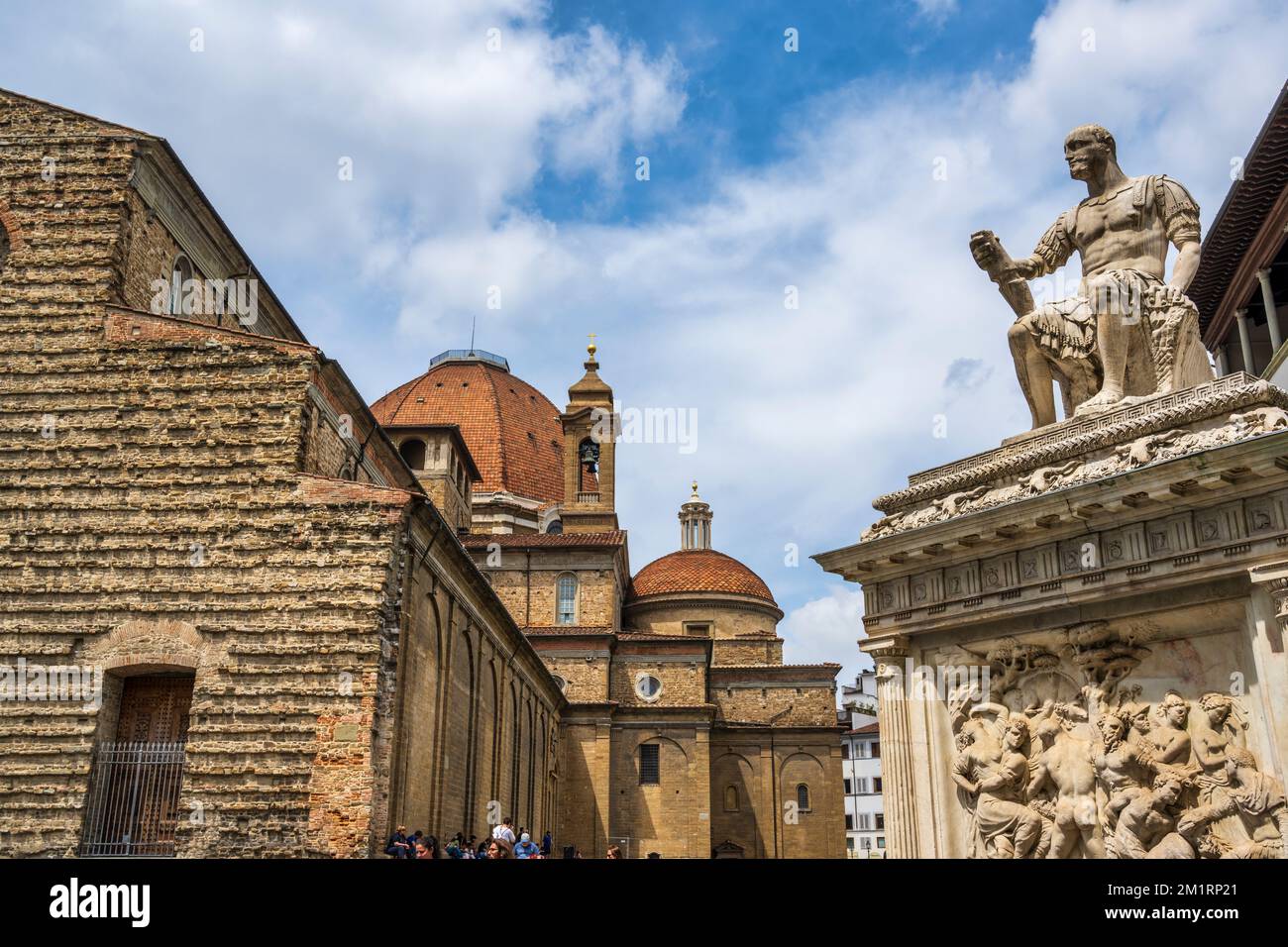 Basilica di San Lorenzo with Monumento a Giovanni delle Bande Nere on the right on Piazza di San