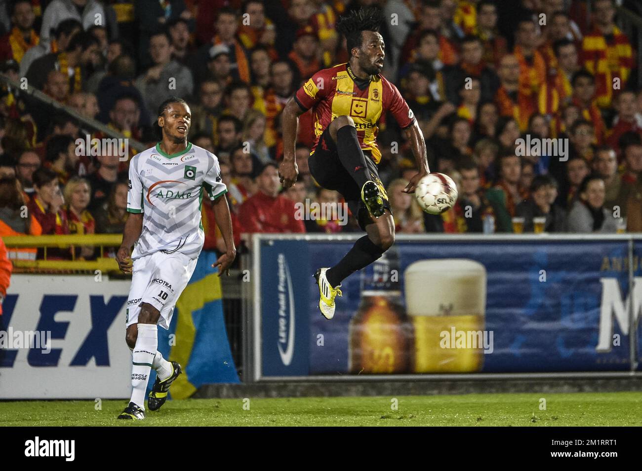 Cercle's Michael Uchebo and Mechelen's Antonio Ghomsi pictured during the Jupiler Pro League match between KV Mechelen and Cercle Brugge, in Mechelen, Saturday 05 October 2013, on day 10 of the Belgian soccer championship.  Stock Photo