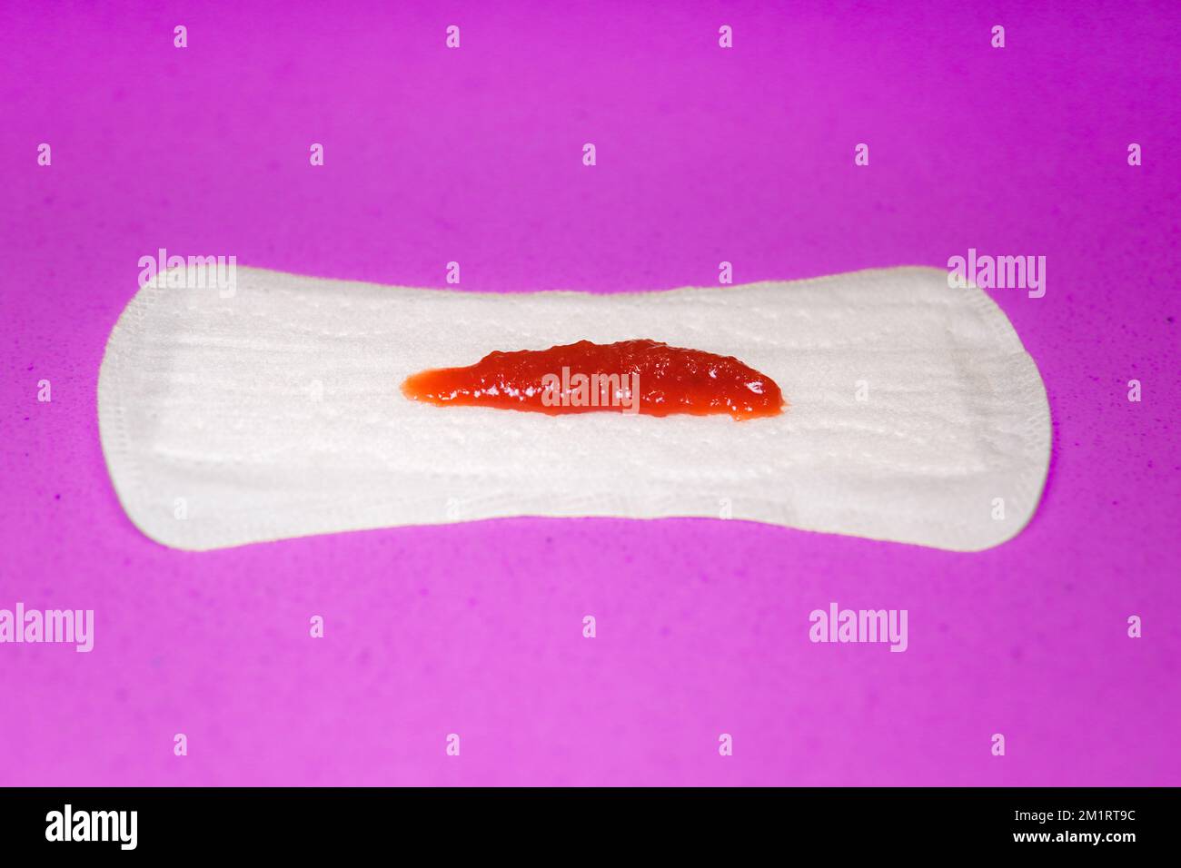 menstrual intimate pad with authentic blood from period with purple