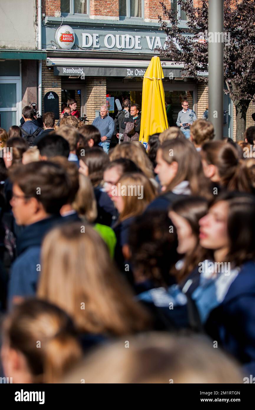 Fellow students of Gregory Bluj pay their respects during a silent
