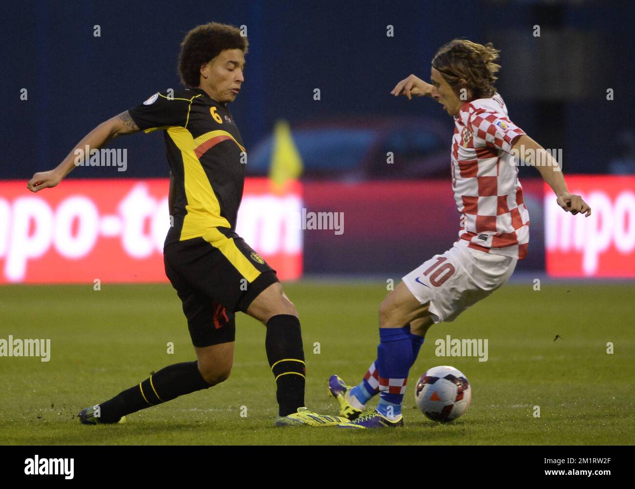 20131011 - ZAGREB, CROATIA: Belgium's Axel Witsel and Croatia's Luka Modric fight for the ball during a soccer game between Belgian national team The Red Devils and the Croatian national team in the Maksimir stadium in Zagreb, Croatia, Friday 11 October 2013, a qualification game for the 2014 FIFA World Cup. With two games to play the Red Devils are leading group A, they need one more point to qualify for the World Cup as group winner.   BELGA PHOTO DIRK WAEM Stock Photo