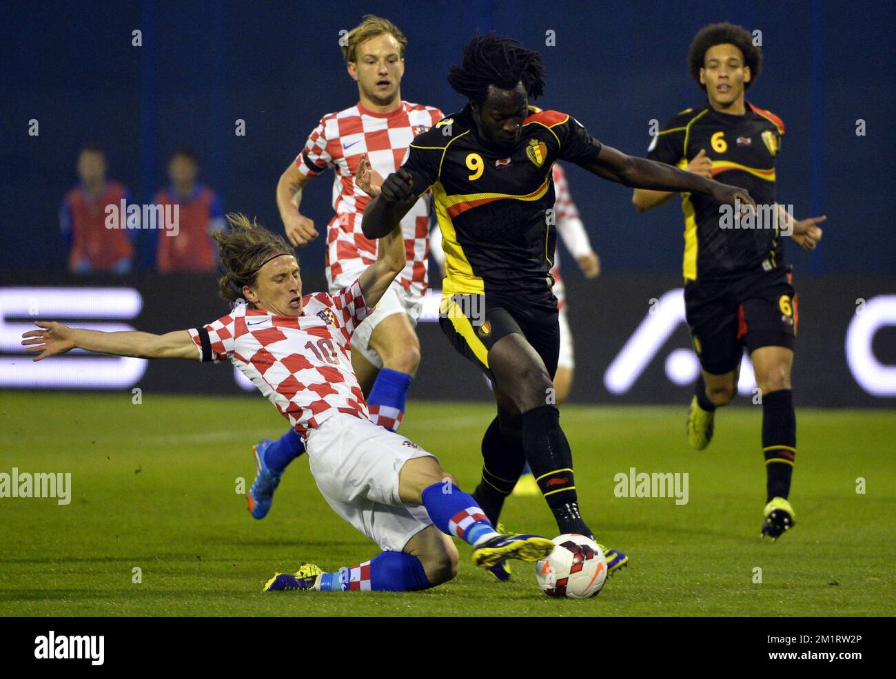 20131011 - ZAGREB, CROATIA: Croatia's Luka Modric and Belgium's Romelu Lukaku fight for the ball during a soccer game between Belgian national team The Red Devils and the Croatian national team in the Maksimir stadium in Zagreb, Croatia, Friday 11 October 2013, a qualification game for the 2014 FIFA World Cup. With two games to play the Red Devils are leading group A, they need one more point to qualify for the World Cup as group winner. BELGA PHOTO ERIC LALMAND Stock Photo