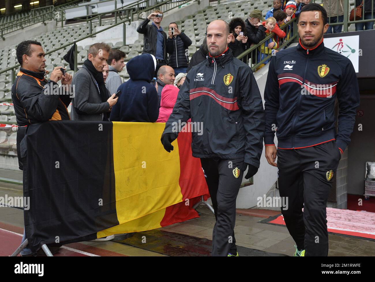 Belgium's Laurent Ciman and Belgium's Moussa Dembele arrive for a training session of Belgian national soccer team Red Devils in Neerpede, Brussels, on Monday 14 October 2013. On October 15th Red Devils play a qualification game for the 2014 FIFA World Cup against Wales.  Stock Photo