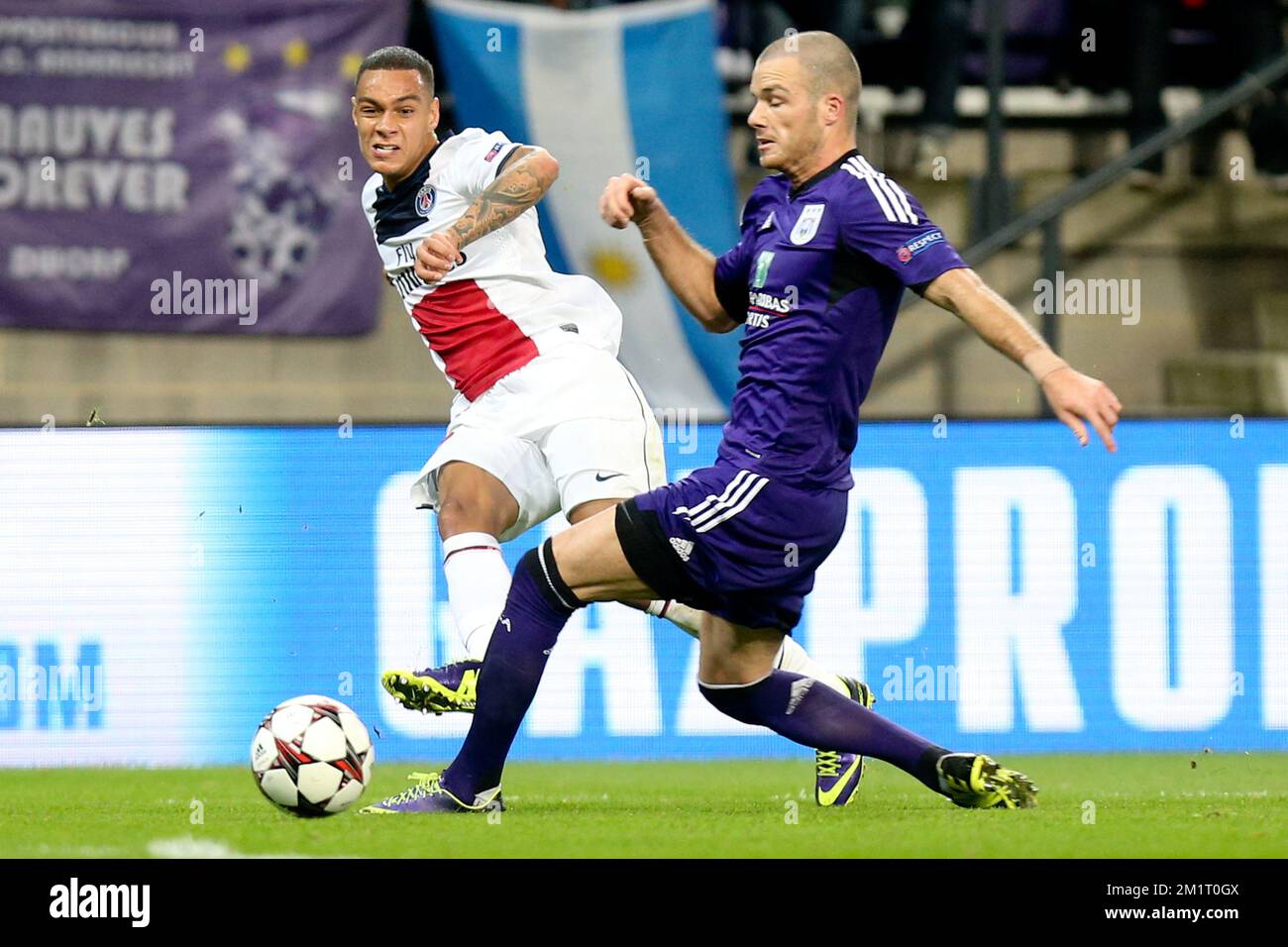 PSG's Gregory van der Wiel sports a tattoo in his neck as he