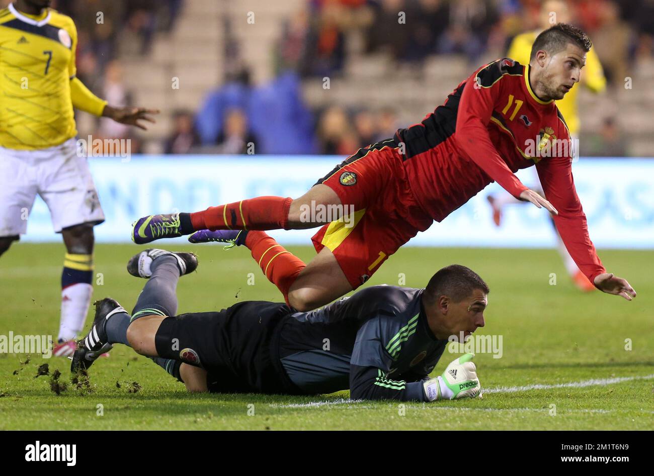 Colombia's goalkeeper Faryd Mondragon and Belgium's Kevin Mirallas fight for the ball during a friendly soccer game between the Belgian national soccer team Red Devils and Colombia, at the Koning Boudewijn Stadion - Stade Roi Baudouin in Brussels, on Thursday 14 November 2013. BELGA PHOTO VIRGINIE LEFOUR Stock Photo