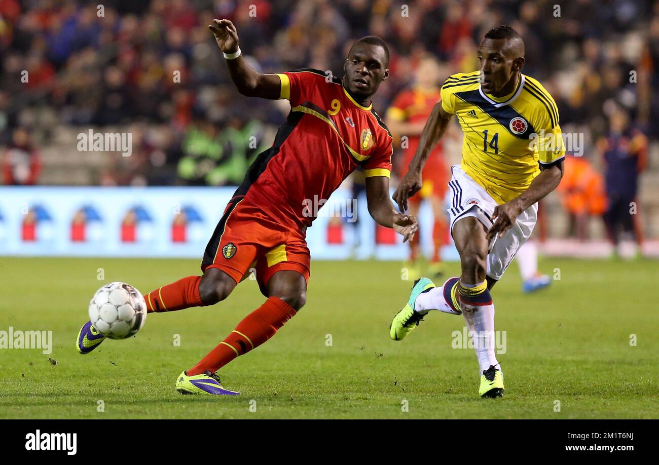 Belgium's Christian Benteke and Colombia's Luis Amaranto Perea fight for the ball during a friendly soccer game between the Belgian national soccer team Red Devils and Colombia, at the Koning Boudewijn Stadion - Stade Roi Baudouin in Brussels, on Thursday 14 November 2013. BELGA PHOTO VIRGINIE LEFOUR Stock Photo