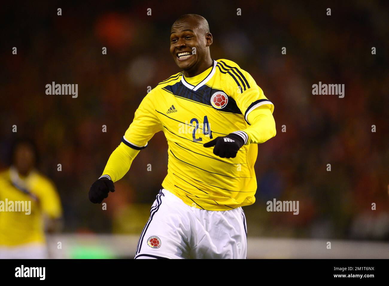 Colombia's Victor Ibarbo celebrates after scoring the 0-2 goal during a friendly soccer game between the Belgian national soccer team Red Devils and Colombia, at the Koning Boudewijn Stadion - Stade Roi Baudouin in Brussels, on Thursday 14 November 2013. BELGA PHOTO YORICK JANSENS Stock Photo