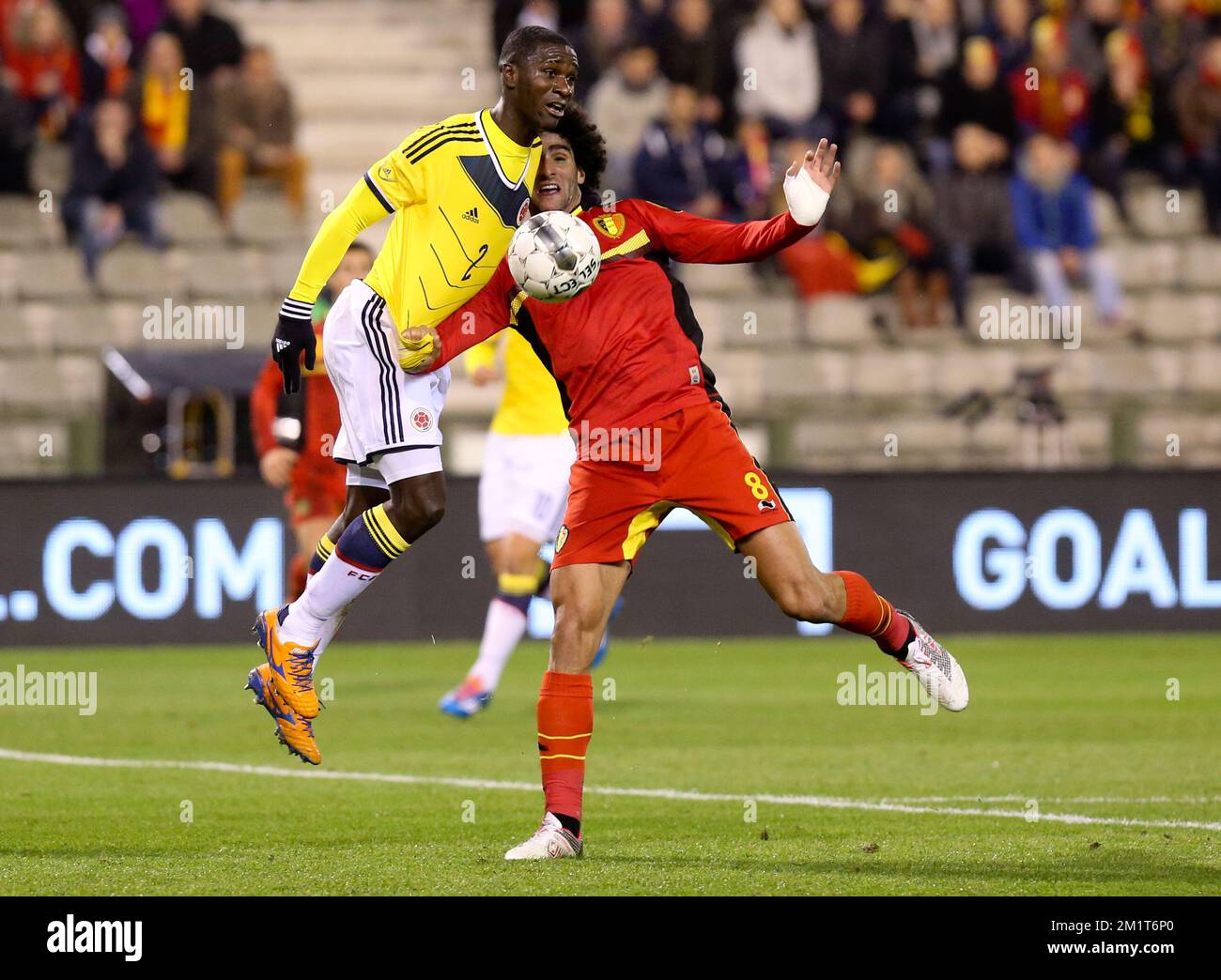 Colombia's Cristian Zapata and Belgium's Marouane Fellaini fight for the ball during a friendly soccer game between the Belgian national soccer team Red Devils and Colombia, at the Koning Boudewijn Stadion - Stade Roi Baudouin in Brussels, on Thursday 14 November 2013. BELGA PHOTO VIRGINIE LEFOUR Stock Photo