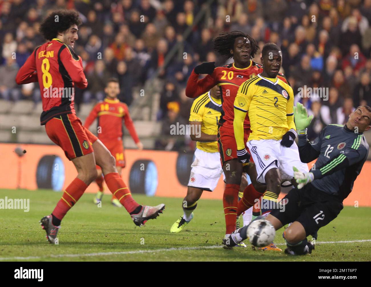 Belgium's Marouane Fellaini, Belgium's Romelu Lukaku, Colombia's Cristian Zapata and Colombia's goalkeeper Faryd Mondragon fight for the ball during a friendly soccer game between the Belgian national soccer team Red Devils and Colombia, at the Koning Boudewijn Stadion - Stade Roi Baudouin in Brussels, on Thursday 14 November 2013. BELGA PHOTO VIRGINIE LEFOUR Stock Photo