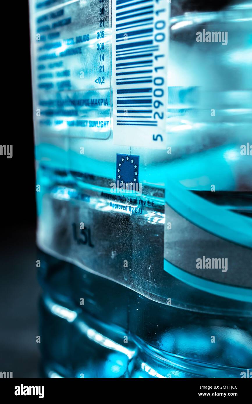 A selective focus shot of a small EU flag on a water bottle Stock Photo