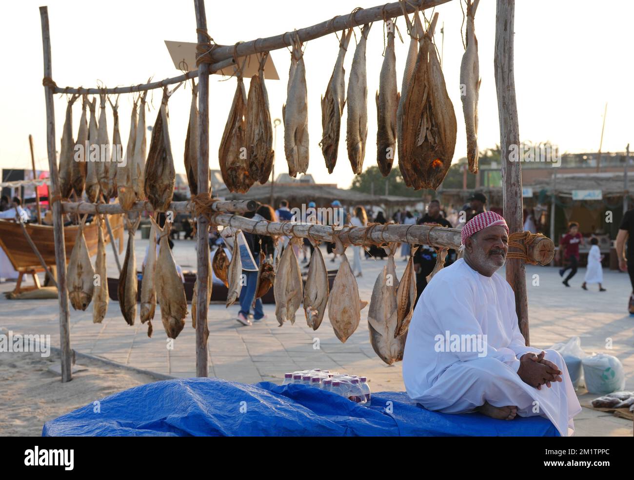 A Fisherman sells his fish in the Katara Cultural Village in Doha