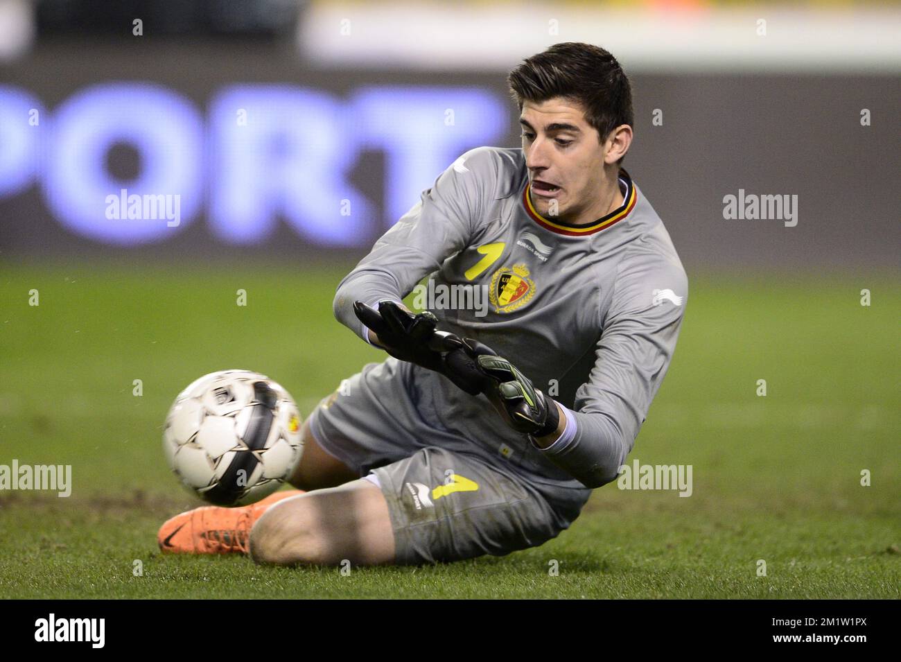 Belgium's goalkeeper Thibaut Courtois in action with the ball during a friendly soccer game between the Belgian national team the Red Devils and Ivory Coast, Wednesday 05 March 2014 in Brussels.  Stock Photo