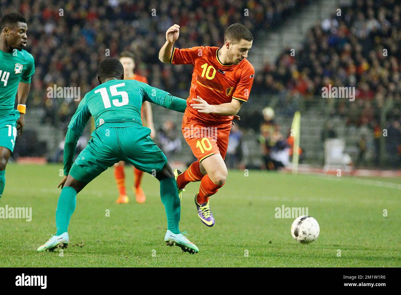 Ivory Coast's Max Gradel and Belgium's Eden Hazard fight for the ball during a friendly soccer game between the Belgian national team the Red Devils and Ivory Coast, Wednesday 05 March 2014 in Brussels.  Stock Photo