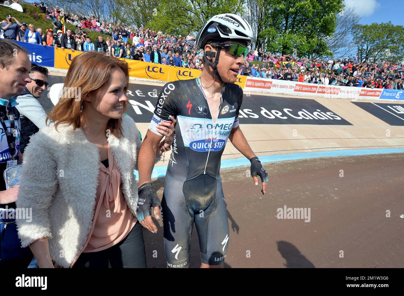 Dutch Niki Terpstra of team Omega Pharma - Quick Step celebrates with his  wife Ramona van der Lecq after winning the hundred and twelfth edition of  'Paris-Roubaix' one day classic cycling race,
