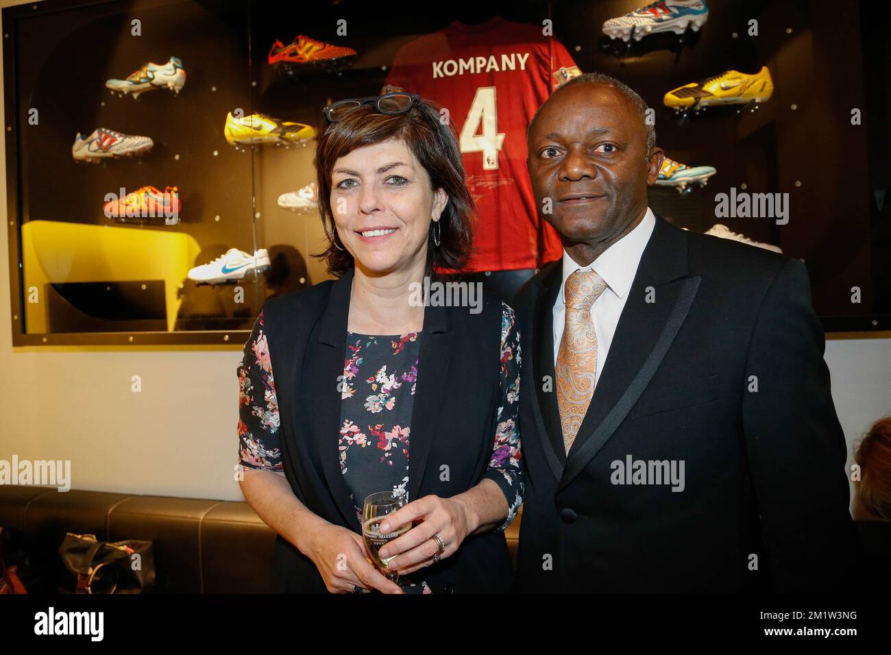 Minister Joelle Milquet and Pierre Kompany pictured during the opening of the 'Good Kompany' sports bar near Grand-Place - Grote Markt in Brussels city center, at the occasion of the opening of this new sports bar owned by international soccer player Vincent Kompany, Friday 18 April 2014.  Stock Photo