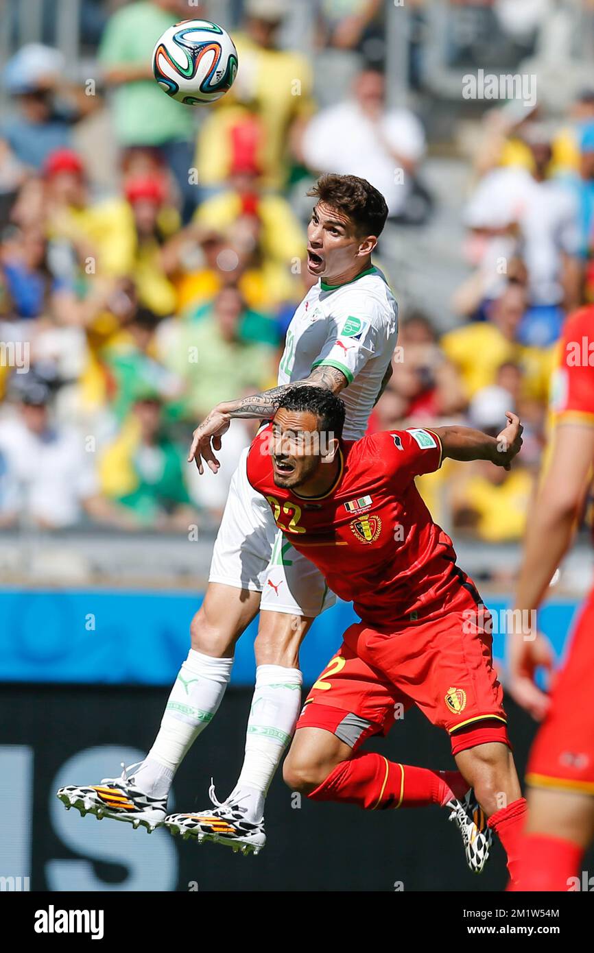 Algeria's Carl Medjani and Belgium's Nacer Chadli fight for the ball during a soccer game between Belgian national team The Red Devils and Algeria in Belo Horizonte, Brazil, the first game in Group H of the first round of the 2014 FIFA World Cup, Tuesday 17 June 2014. Stock Photo