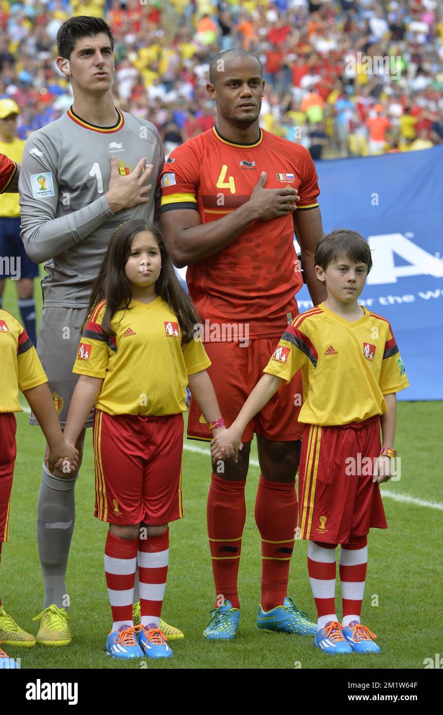 20140622 - RIO DE JANEIRO, BRAZIL: Belgium's goalkeeper Thibaut Courtois, Belgium's captain Vincent Kompany and Belgian Victor pictured at the start of a soccer game between Belgian national team The Red Devils and Russia in Rio de Janeiro, Brazil, the second game in Group H of the first round of the 2014 FIFA World Cup, Sunday 22 June 2014.   BELGA PHOTO DIRK WAEM Stock Photo