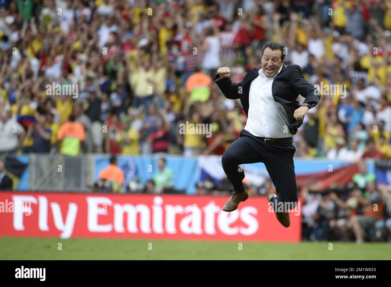 20140622 - RIO DE JANEIRO, BRAZIL: Belgium's head coach Marc Wilmots celebrates after scoring the 1-0 goal during a soccer game between Belgian national team The Red Devils and Russia in Rio de Janeiro, Brazil, the second game in Group H of the first round of the 2014 FIFA World Cup, Sunday 22 June 2014.   BELGA PHOTO DIRK WAEM Stock Photo