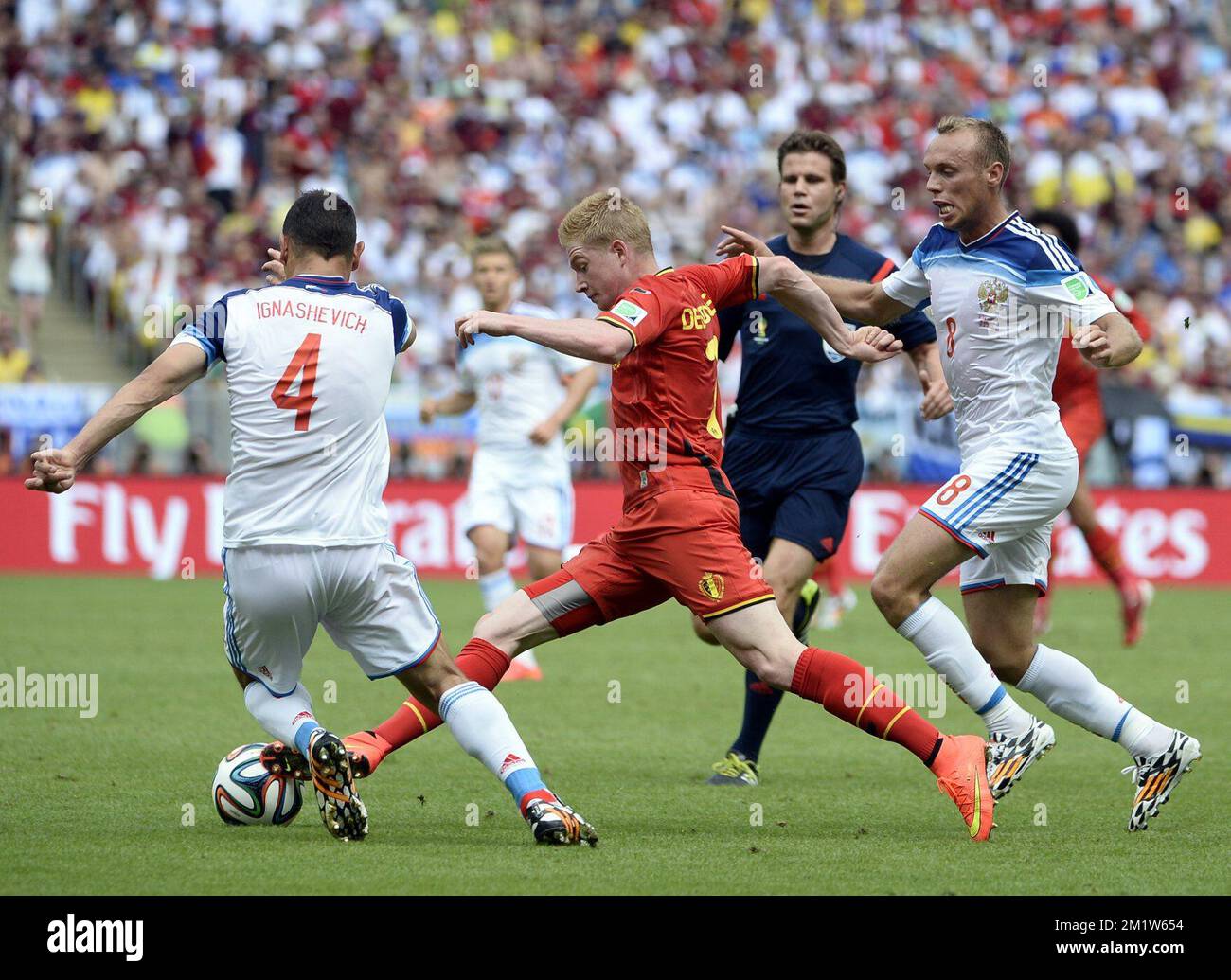 20140622 - RIO DE JANEIRO, BRAZIL: Russia's Sergei Ignashevich, Belgium's Kevin De Bruyne and Russia's Denis Glushakov in action during a soccer game between Belgian national team The Red Devils and Russia in Rio de Janeiro, Brazil, the second game in Group H of the first round of the 2014 FIFA World Cup, Sunday 22 June 2014.   BELGA PHOTO DIRK WAEM Stock Photo