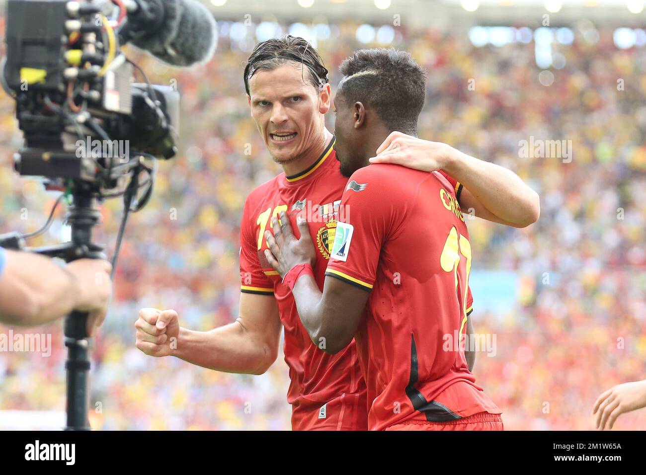 20140622 - RIO DE JANEIRO, BRAZIL: Belgium's Divock Origi celebrates after scoring the 1-0 goal with Daniel Van Buyten (L) at a soccer game between Belgian national team The Red Devils and Russia in Rio de Janeiro, Brazil, the second game in Group H of the first round of the 2014 FIFA World Cup, Sunday 22 June 2014. BELGA PHOTO BRUNO FAHY Stock Photo