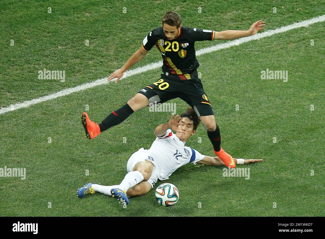 20140626 - SAO PAULO, BRAZIL: Belgium's Adnan Januzaj and South Korea's Lee Yong fight for the ball during the match between Belgian national soccer team Red Devils and South-Korea, third match in group H, in the stadium 'Arena de Sao Paulo', in Itaquera, Sao Paulo, Brazil, during the 2014 FIFA World Cup, Thursday 26 June 2014. The Red Devils lead their group H with two victories. BELGA PHOTO BRUNO FAHY Stock Photo