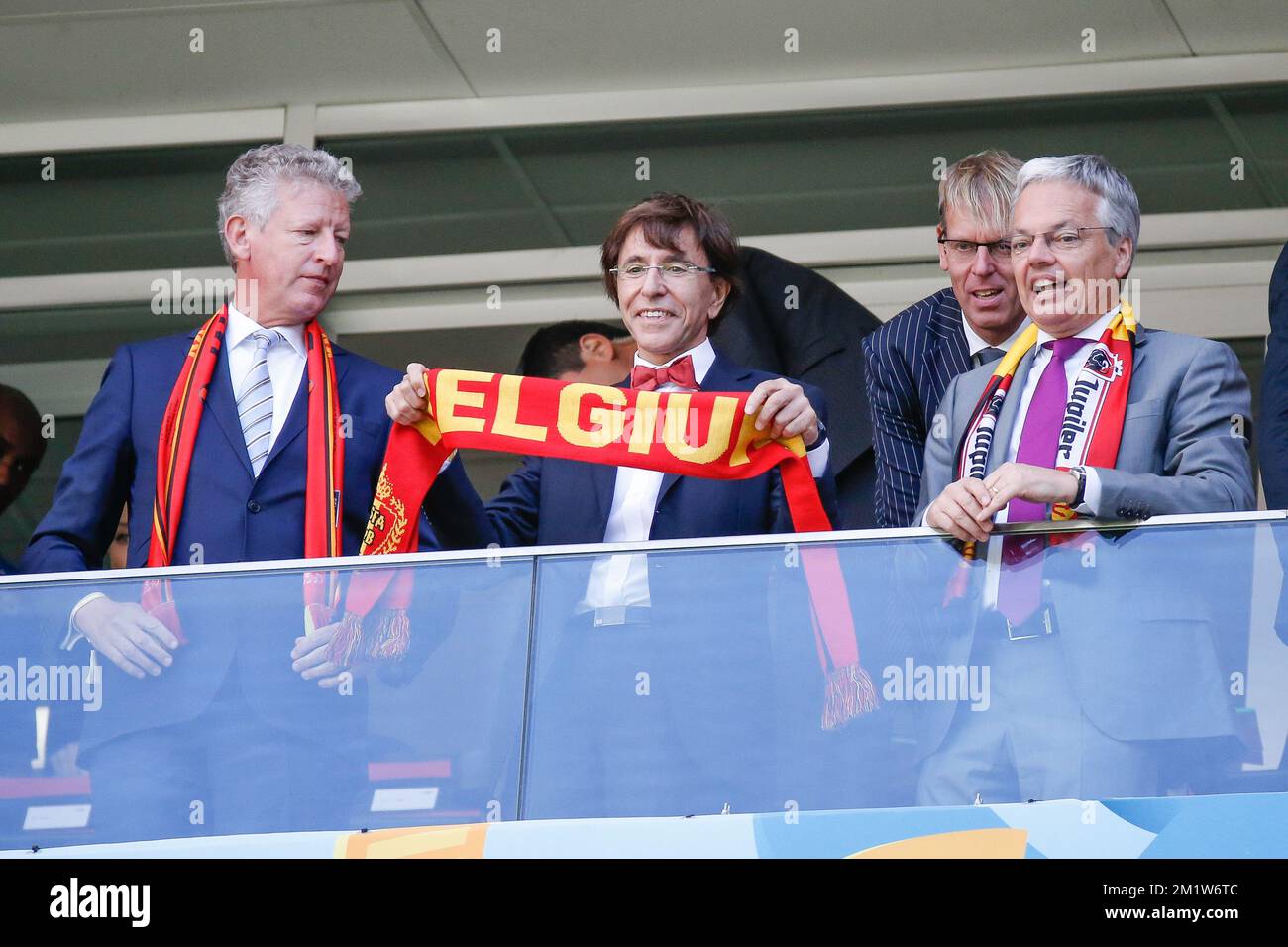 Outgoing Vice-Minister and Defence Minister Pieter De Crem, Outgoing Prime Minister Elio Di Rupo and Outgoing Vice-Prime Minister and Foreign Minister Didier Reynders pictured during the quarter final match between Belgian national soccer team Red Devils and Argentina, in Estadio Nacional Mane Garrincha, in Brasilia, Brazil, during the 2014 FIFA World Cup, Saturday 05 July 2014. BELGA PHOTO BRUNO FAHY Stock Photo