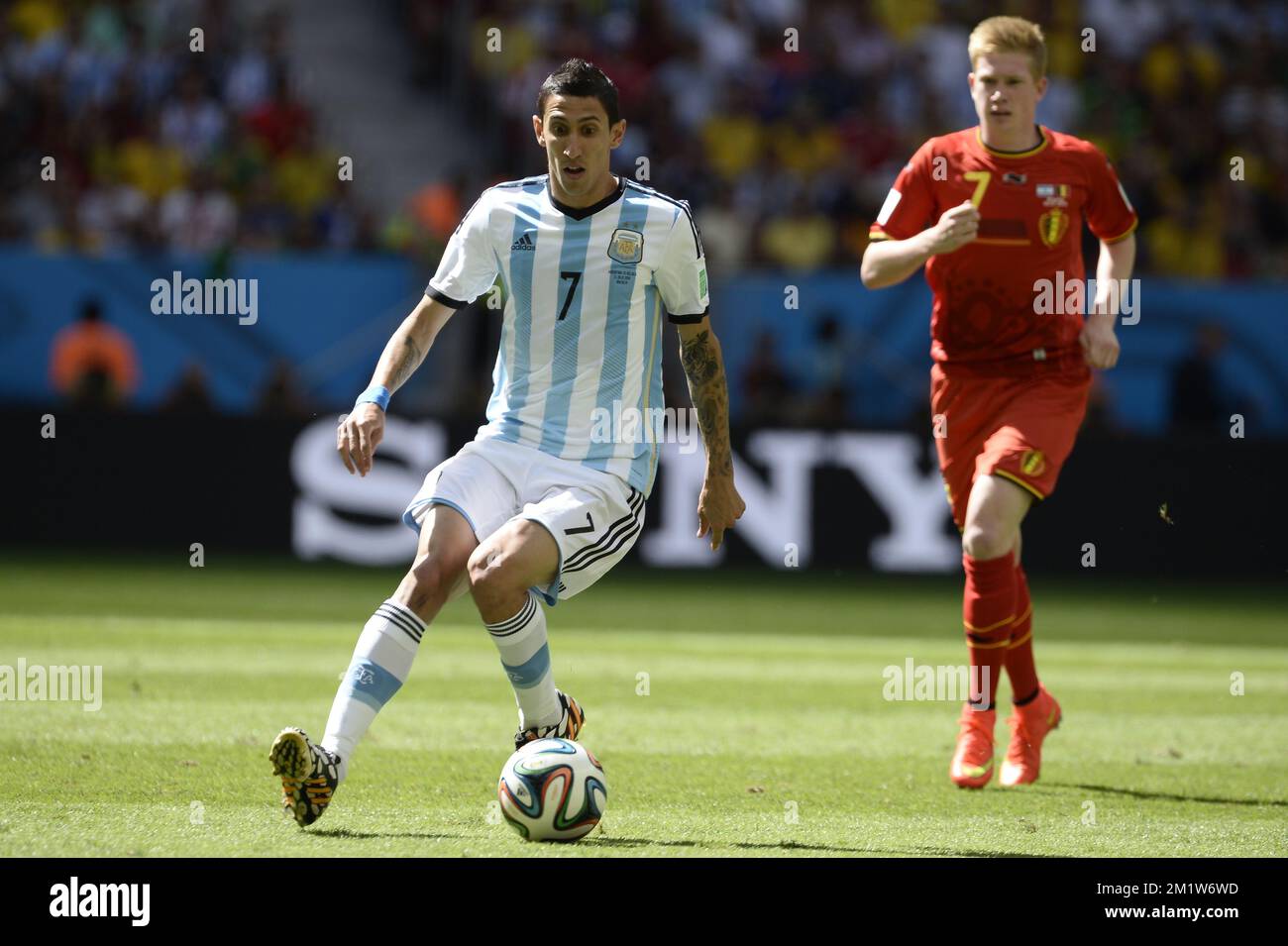 Argentina's Angel di Maria and Belgium's Kevin De Bruyne fight for the ball during the quarter final match between Belgian national soccer team Red Devils and Argentina, in Estadio Nacional Mane Garrincha, in Brasilia, Brazil, during the 2014 FIFA World Cup, Saturday 05 July 2014.  BELGA PHOTO DIRK WAEM Stock Photo