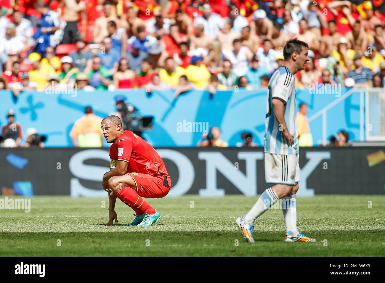 Belgium's captain Vincent Kompany looks dejected during the quarter final match between Belgian national soccer team Red Devils and Argentina, in Estadio Nacional Mane Garrincha, in Brasilia, Brazil, during the 2014 FIFA World Cup, Saturday 05 July 2014. BELGA PHOTO BRUNO FAHY Stock Photo