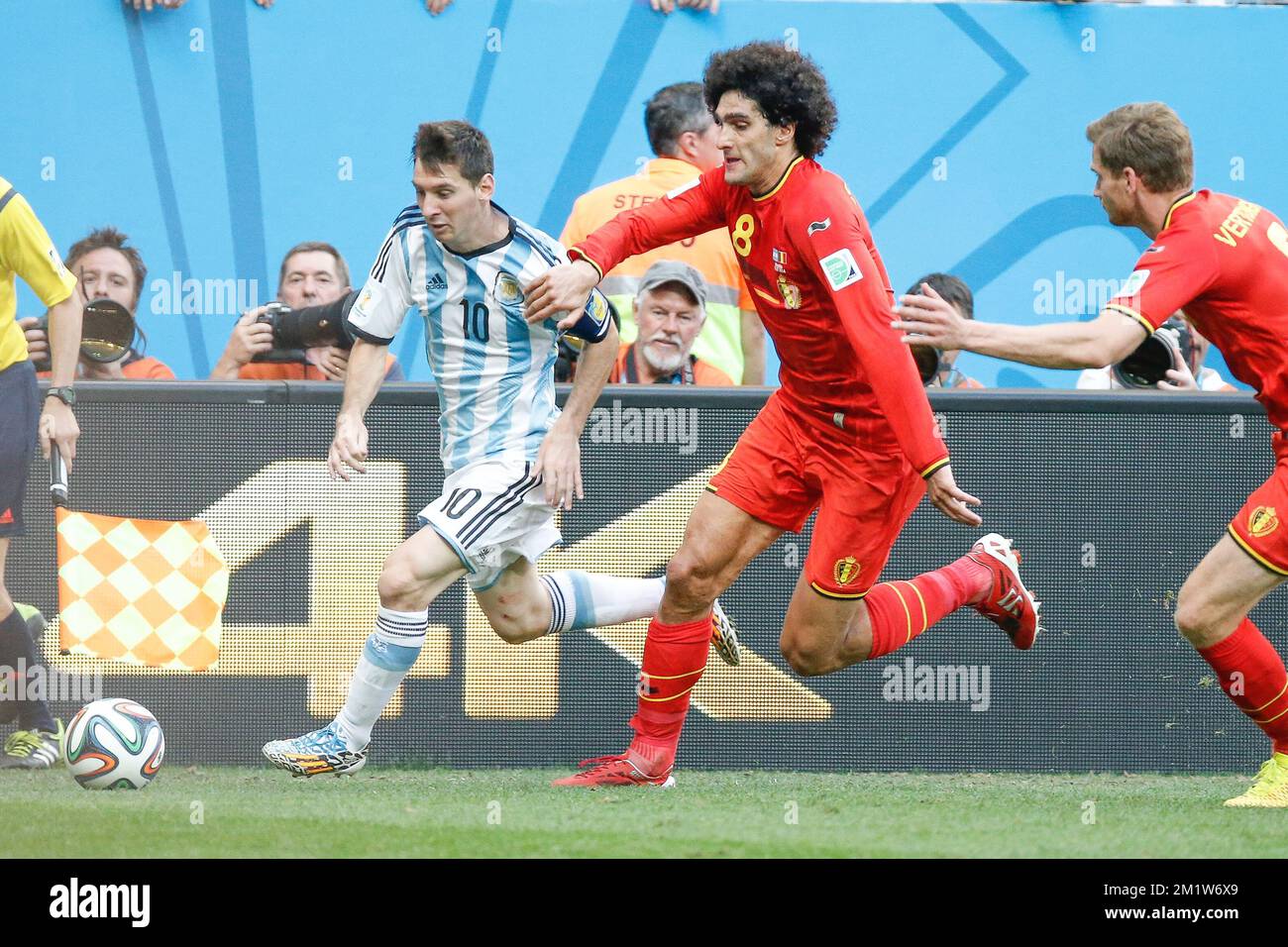 Argentina's Lionel Messi and Belgium's Marouane Fellaini fight for the ball during the quarter final match between Belgian national soccer team Red Devils and Argentina, in Estadio Nacional Mane Garrincha, in Brasilia, Brazil, during the 2014 FIFA World Cup, Saturday 05 July 2014. BELGA PHOTO BRUNO FAHY Stock Photo