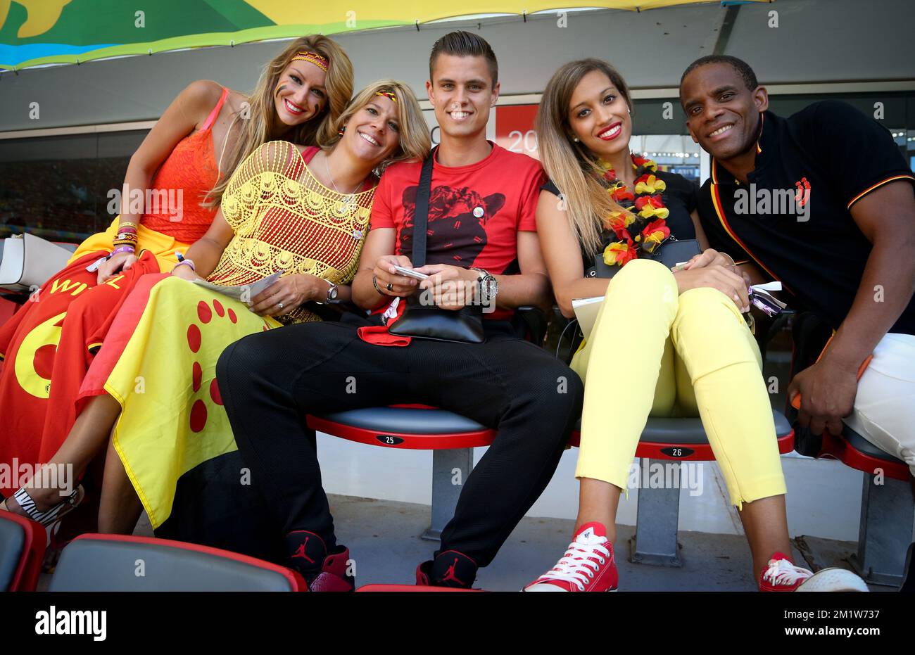 Rafaella Szabo (L), girlfriend of Axel Witsel, and his father Thierry (R) pictured at the start of the quarter final match between Belgian national soccer team Red Devils and Argentina, in Estadio Nacional Mane Garrincha, in Brasilia, Brazil, during the 2014 FIFA World Cup, Saturday 05 July 2014. Stock Photo