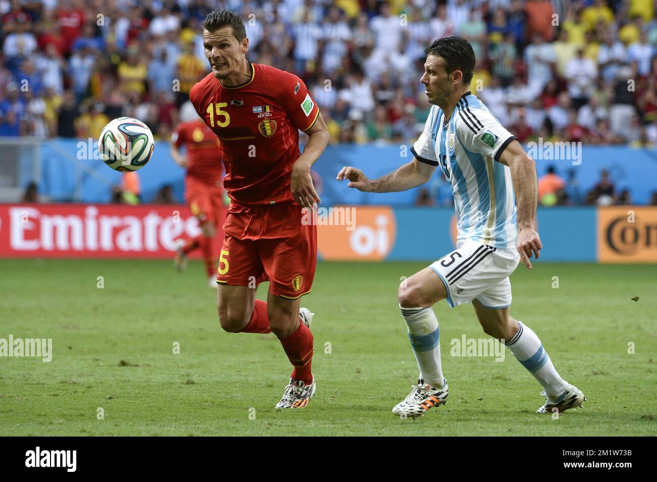 Argentina's Martin Demichelis and Belgium's Daniel Van Buyten fight for the ball during the quarter final match between Belgian national soccer team Red Devils and Argentina, in Estadio Nacional Mane Garrincha, in Brasilia, Brazil, during the 2014 FIFA World Cup, Saturday 05 July 2014.  Stock Photo