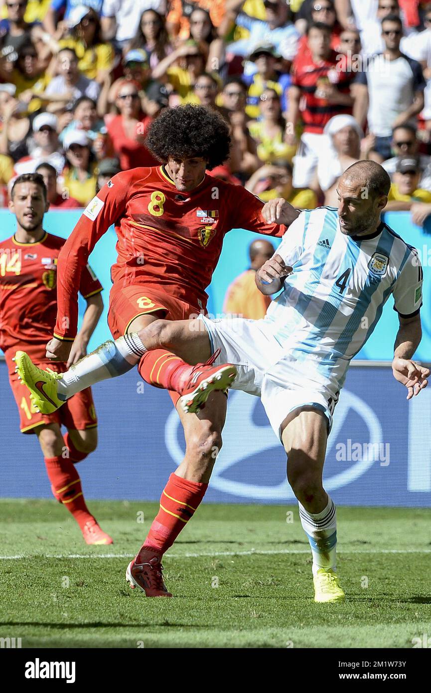 Belgium's Marouane Fellaini and Argentina's Pablo Zabaleta pictured during the quarter final match between Belgian national soccer team Red Devils and Argentina, in Estadio Nacional Mane Garrincha, in Brasilia, Brazil, during the 2014 FIFA World Cup, Saturday 05 July 2014.  Stock Photo