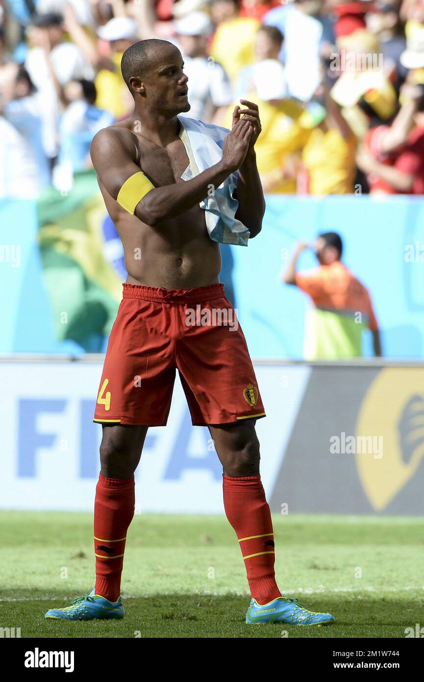 Belgium's captain Vincent Kompany looks dejected after the quarter final match between Belgian national soccer team Red Devils and Argentina, in Estadio Nacional Mane Garrincha, in Brasilia, Brazil, during the 2014 FIFA World Cup, Saturday 05 July 2014.  Stock Photo