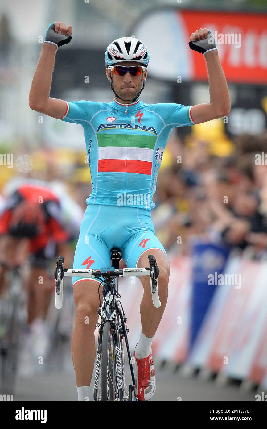 Italian Vincenzo Nibali of Astana Pro Team celebrates as he crosses the  finish line to win the second stage of the 101st edition of the Tour de  France cycling race, 201 km