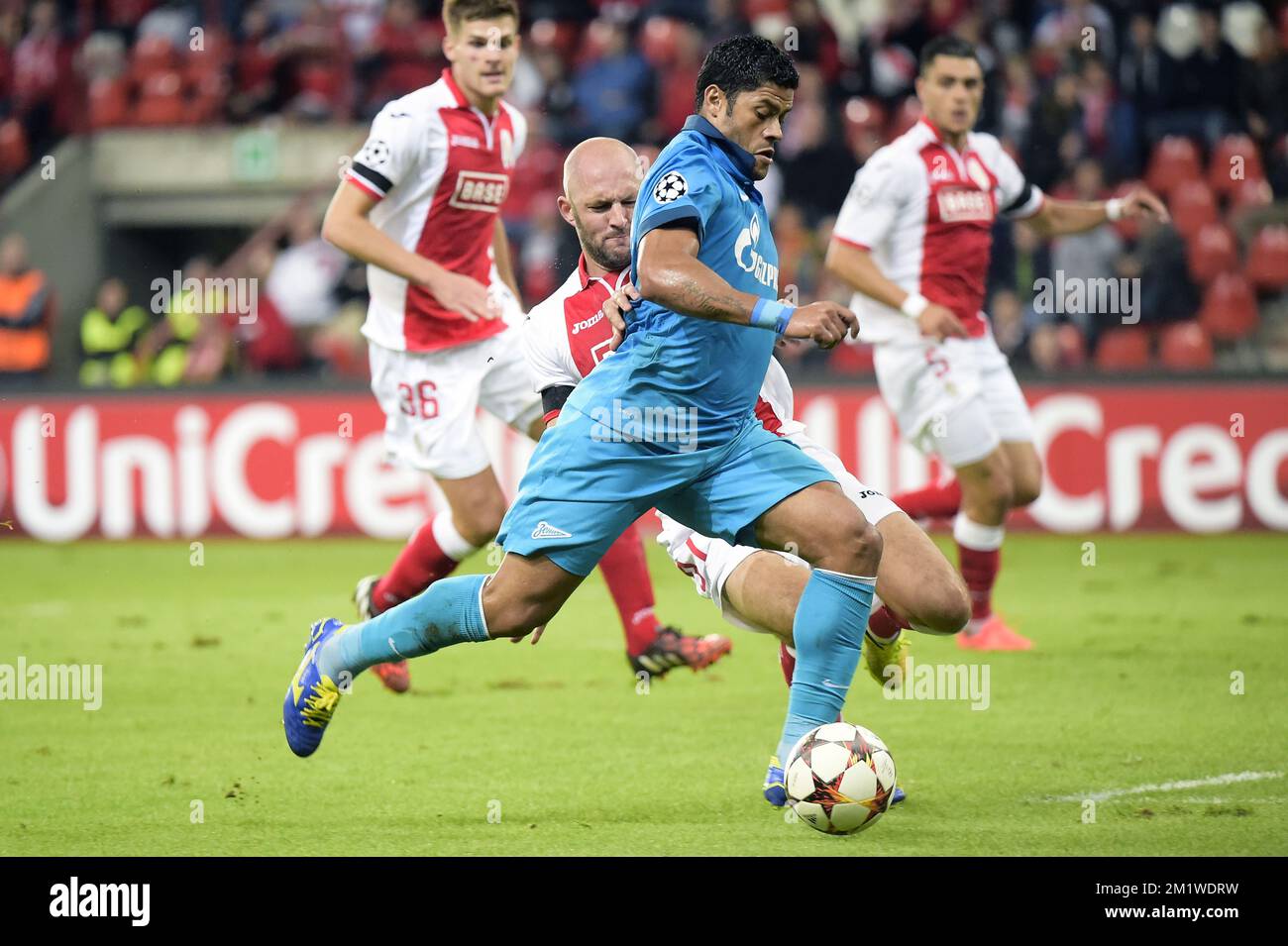 Standard's Jelle Van Damme and Zenit's Hulk fight for the ball during the first leg match between Belgian first division soccer team Standard de Liege and Russian team FC Zenit Saint Petersburg in the playoffs for the UEFA Champions League competition, Wednesday 20 August 2014, in Liege. Stock Photo
