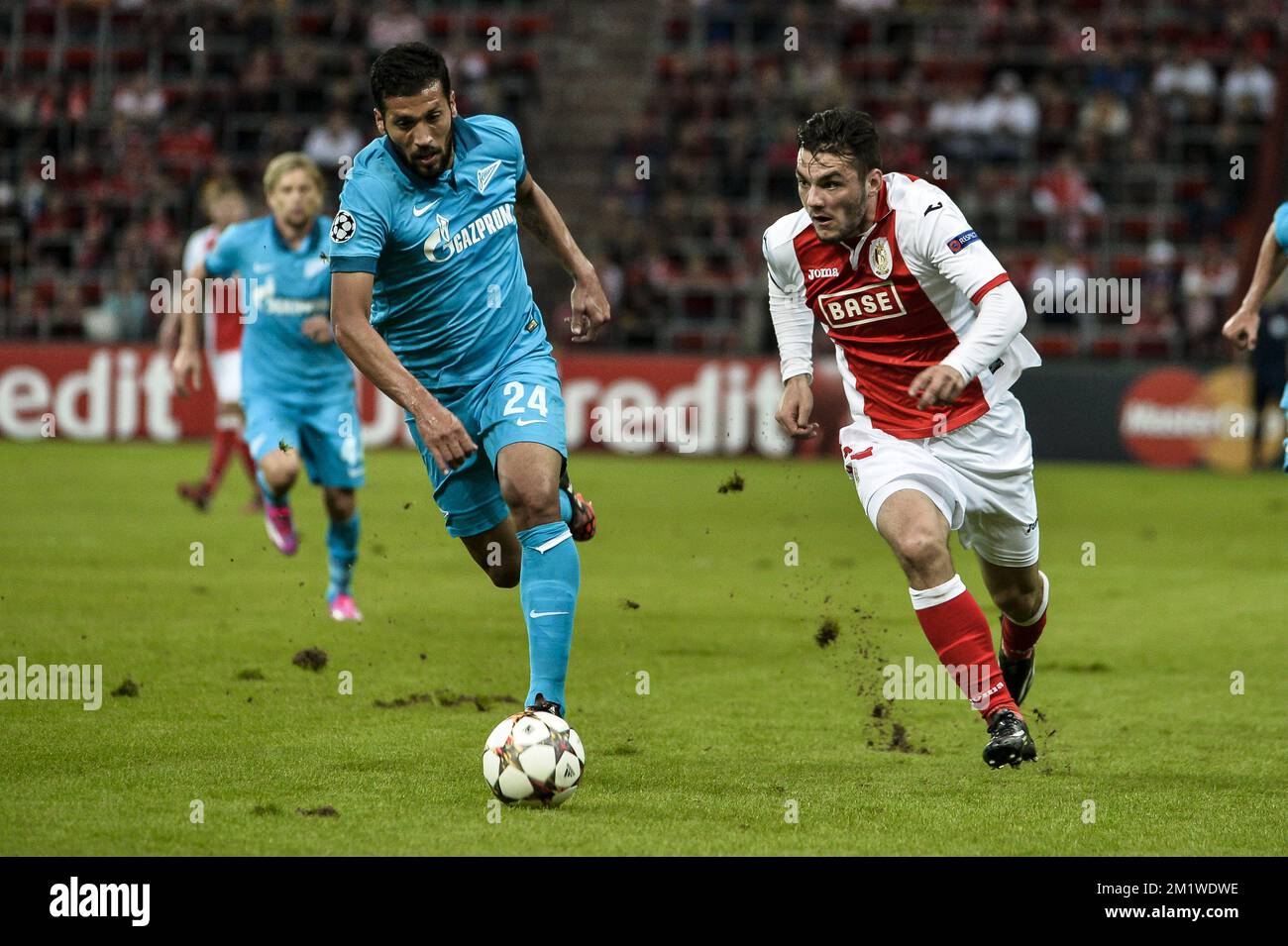 Zenit's Ezequiel Garay and Standard's Anthony Tony Watt pictured during the first leg match between Belgian first division soccer team Standard de Liege and Russian team FC Zenit Saint Petersburg in the playoffs for the UEFA Champions League competition, Wednesday 20 August 2014, in Liege. Stock Photo
