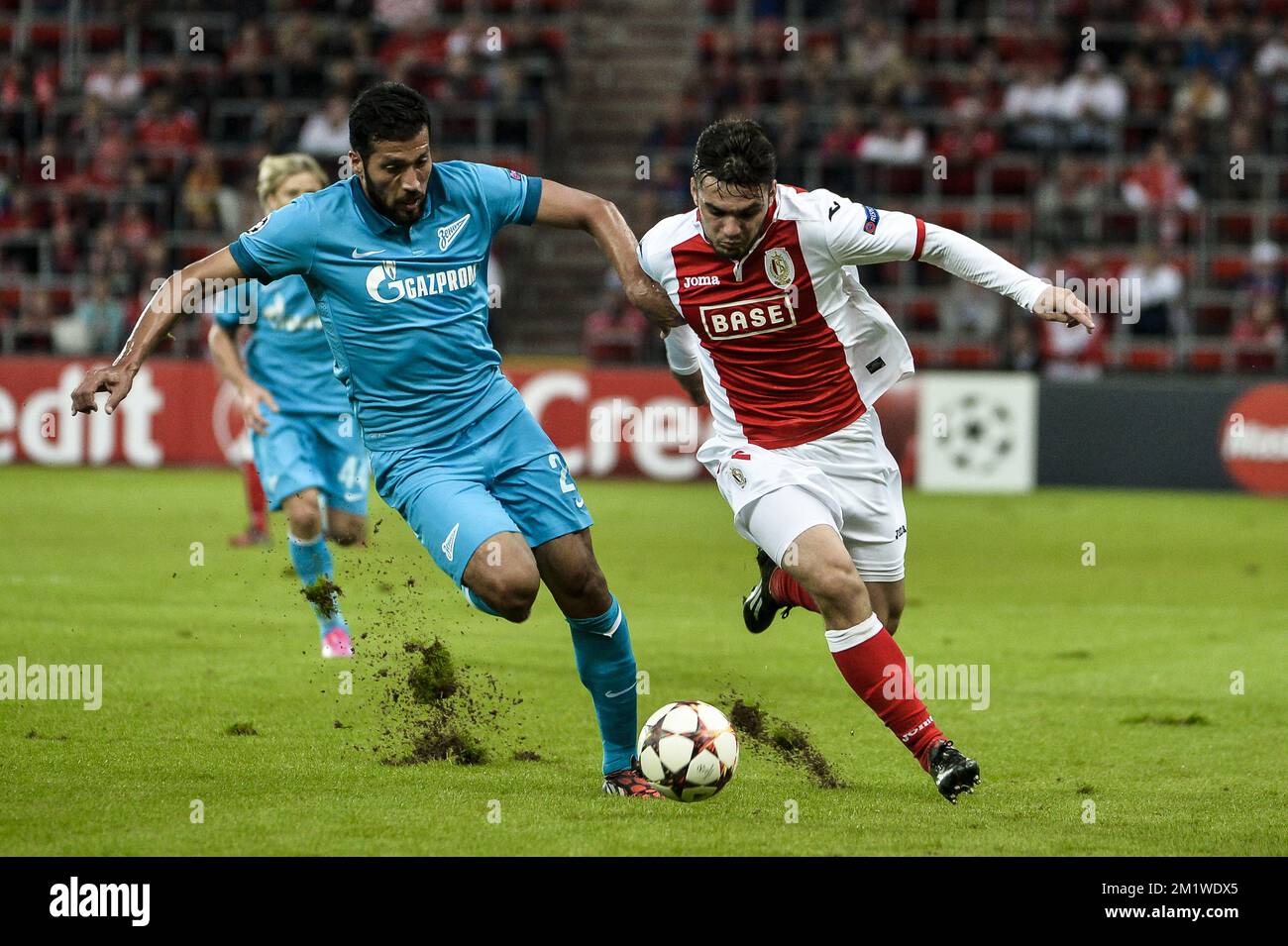 Zenit's Ezequiel Garay and Standard's Anthony Tony Watt pictured during the first leg match between Belgian first division soccer team Standard de Liege and Russian team FC Zenit Saint Petersburg in the playoffs for the UEFA Champions League competition, Wednesday 20 August 2014, in Liege. Stock Photo