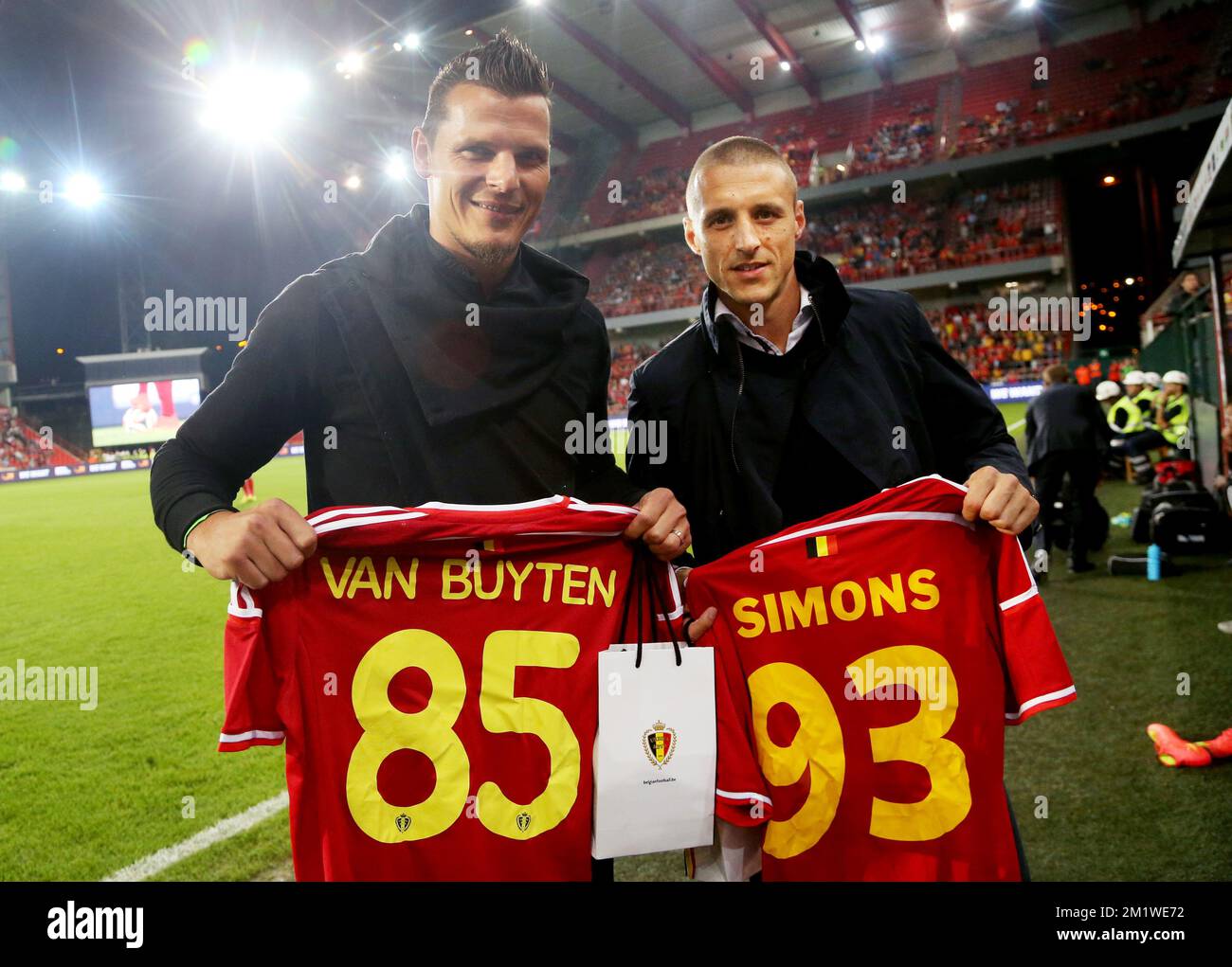 20140904 - BRUSSELS, BELGIUM: Former Red Devil Daniel Van Buyten and Belgium's Timmy Simons pose with their shirts (with numbers of selection in national team) before a friendly game between Belgian national soccer team Red Devils and Australian national soccer team Socceroos, Thursday 04 September 2014, in Brussels. BELGA PHOTO VIRGINIE LEFOUR Stock Photo