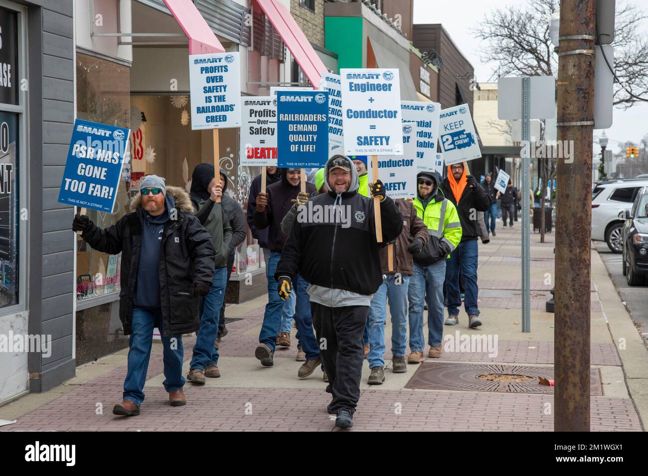 Royal Oak, Michigan, USA. 13th Dec, 2022. Railroad workers rally in suburban Detroit, upset that railroads are emphasizing profits over safety, and still angry that sick pay was not included in the contract that Congress forced on them earlier this month. It was one of a number of rallies held across the United States, organized by the SMART Transportation Division. Credit: Jim West/Alamy Live News Stock Photo