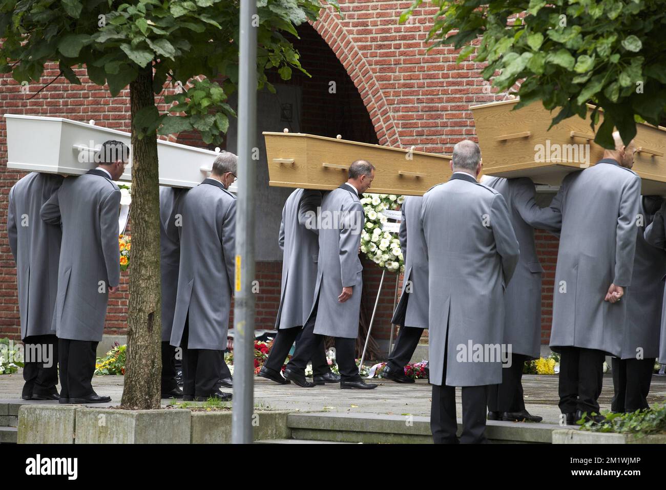 Illustration picture shows the funeral ceremony, Thursday 09 October 2014 in Brasschaat, of the family Noreilde-Hakse, who died in the crash of a Malaysia Airlines plane. Malaysia Airlines Boeing 777 flight MH17 carrying 298 people crashed near the Russian border in Ukraine on 17 July 2014. Among the victims were 4 Belgians and 193 people from The Netherlands.  Stock Photo