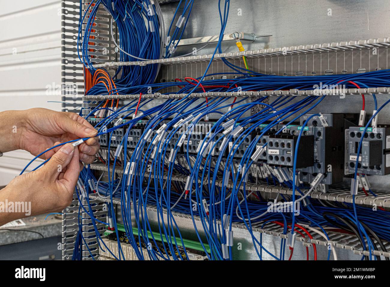 A closeup view of a process of insertion of a tag number to locate