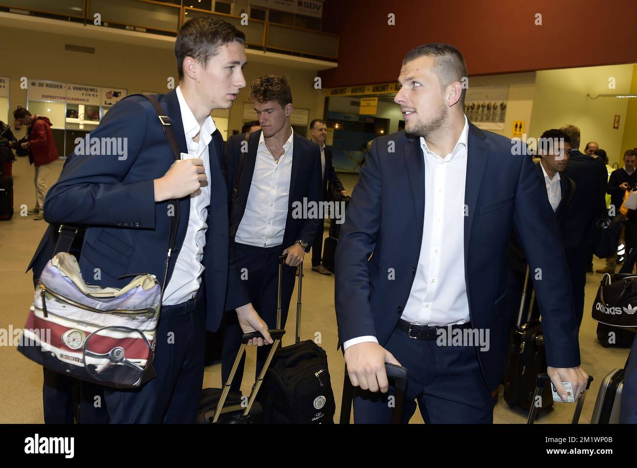 20141022 - OOSTENDE, BELGIUM: Lokeren's Hans Vanaken and Lokeren's goalkeeper Davino Verhulst pictured at the departure of Belgian soccer team KSC Lokeren OVL in Oostende airport, on the way to Trabzon airport, Wednesday 22 October 2014. Tomorrow Lokeren is playing Turkish club Trabzonspor AS in the third day of the group stage of the UEFA Europa League competition, in the group L. BELGA PHOTO YORICK JANSENS Stock Photo
