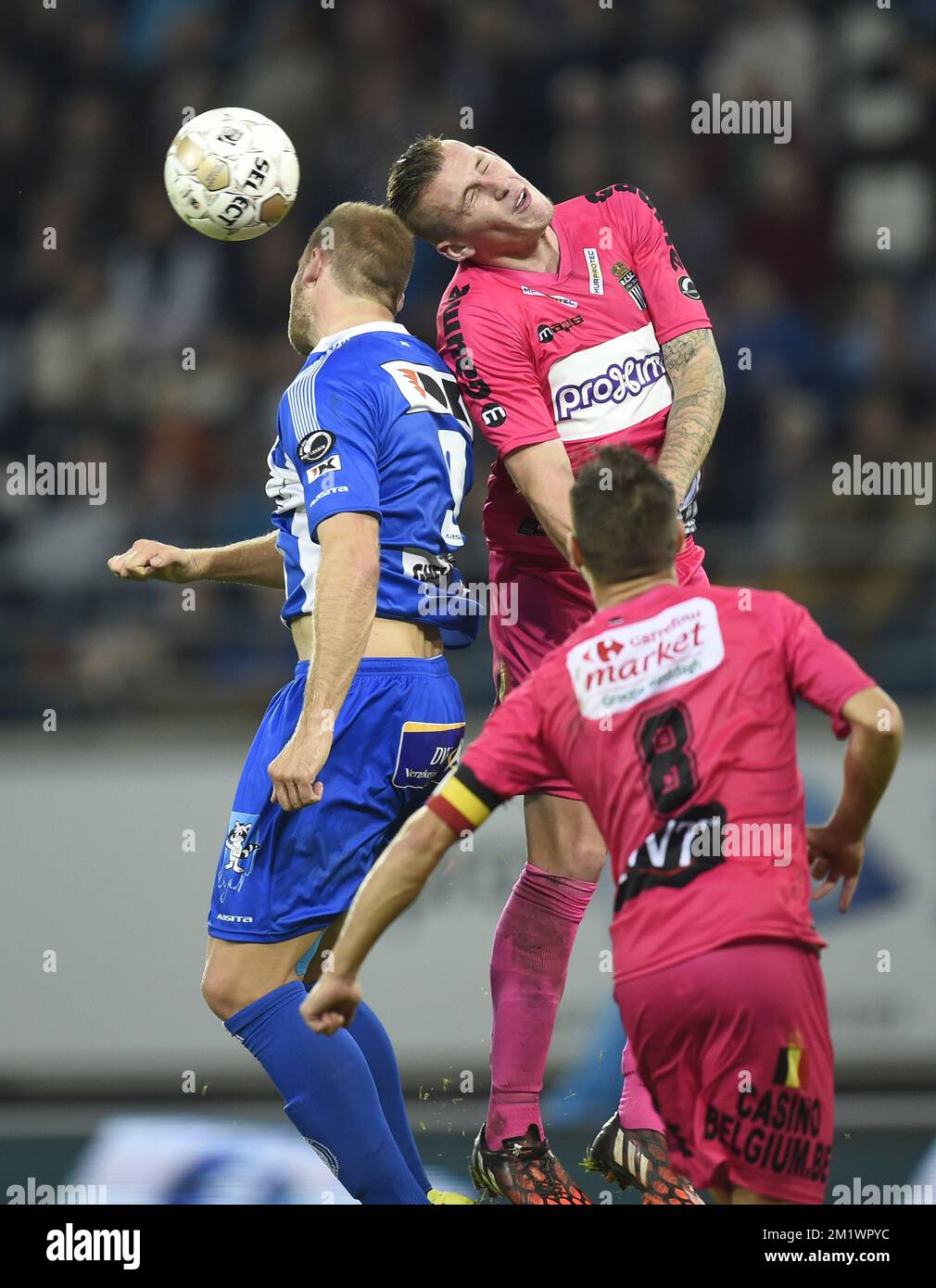 20141018 - GENT, BELGIUM: Charleroi's Clement Taimont and Gent's Laurent Depoitre fight for the ball during the Jupiler Pro League match between AA Gent and Charleroi, in Gent, Saturday 18 October 2014, on day 11 of the Belgian soccer championship. BELGA PHOTO JOHN THYS Stock Photo