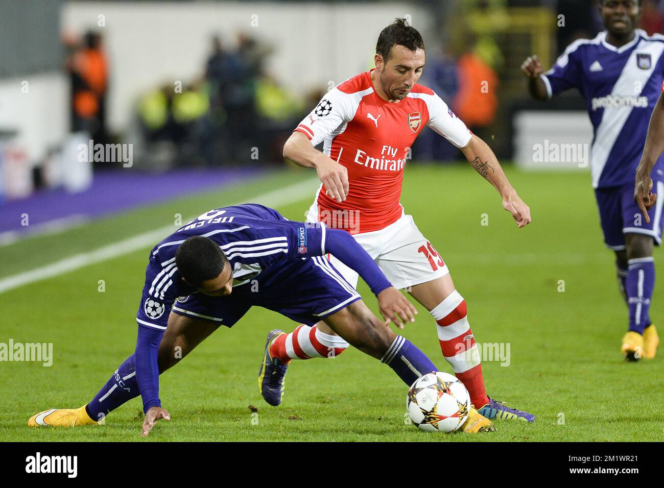 Anderlecht's Youri Tielemans and Arsenal's Santi Cazorla fight for the ball during a third group stage game between RSCA Anderlecht and English team Arsenal, in the group D of the UEFA Champions League competition, Wednesday 22 October 2014. BELGA PHOTO LAURIE DIEFFEMBACQ Stock Photo
