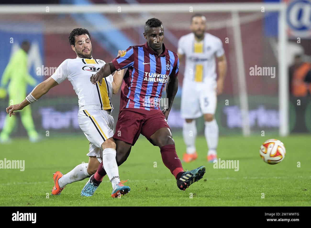 20141023 - TRABZON, TURKEY: Lokeren's Koen Persoons and Trabzonspor's Kevin Constant fight for the ball during a game between Turkish club Trabzonspor AS and Belgian soccer team KSC Lokeren OVL in the Huseyin Avni Aker Stadium in Trabzon, Thursday 23 October 2014. It is the third day of the group stage of the UEFA Europa League competition, in group L. BELGA PHOTO YORICK JANSENS Stock Photo