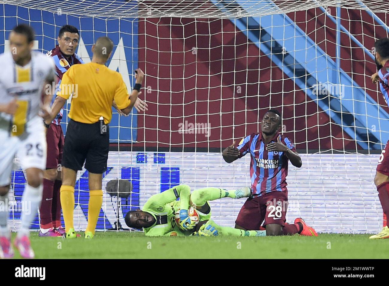 20141023 - TRABZON, TURKEY: Lokeren's goalkeeper Barry Boubacar Copa and Trabzonspor's Majeed Waris pictured during a game between Turkish club Trabzonspor AS and Belgian soccer team KSC Lokeren OVL in the Huseyin Avni Aker Stadium in Trabzon, Thursday 23 October 2014. It is the third day of the group stage of the UEFA Europa League competition, in group L. BELGA PHOTO YORICK JANSENS Stock Photo