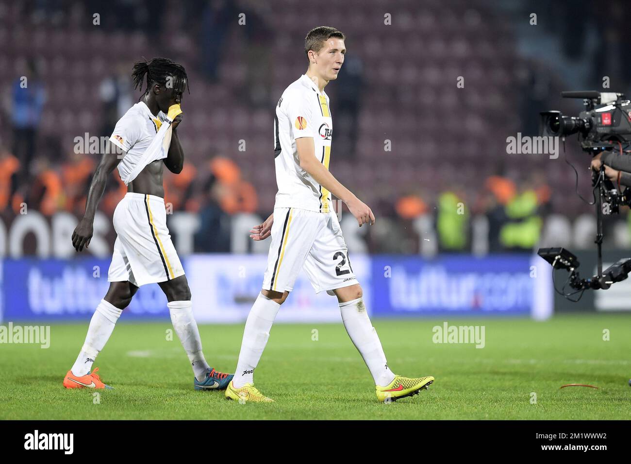 20141023 - TRABZON, TURKEY: Lokeren's Mbaye Leye and Lokeren's Hans Vanaken look dejected after a game between Turkish club Trabzonspor AS and Belgian soccer team KSC Lokeren OVL in the Huseyin Avni Aker Stadium in Trabzon, Thursday 23 October 2014. It is the third day of the group stage of the UEFA Europa League competition, in group L. BELGA PHOTO YORICK JANSENS Stock Photo