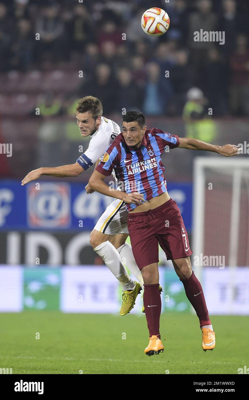 20141023 - TRABZON, TURKEY: Lokeren's Killian Overmeire and Trabzonspor's Oscar Cardozo fight for the ball during a game between Turkish club Trabzonspor AS and Belgian soccer team KSC Lokeren OVL in the Huseyin Avni Aker Stadium in Trabzon, Thursday 23 October 2014. It is the third day of the group stage of the UEFA Europa League competition, in group L. BELGA PHOTO YORICK JANSENS Stock Photo