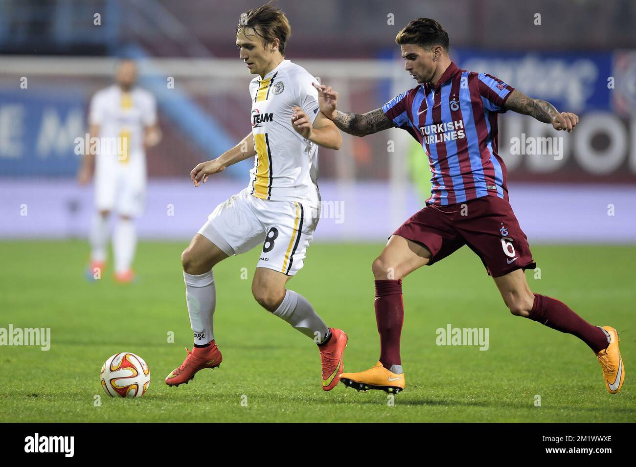 20141023 - TRABZON, TURKEY: Lokeren's Besart Abdurahimi and Trabzonspor's Carl Medjani fight for the ball during a game between Turkish club Trabzonspor AS and Belgian soccer team KSC Lokeren OVL in the Huseyin Avni Aker Stadium in Trabzon, Thursday 23 October 2014. It is the third day of the group stage of the UEFA Europa League competition, in group L. BELGA PHOTO YORICK JANSENS Stock Photo