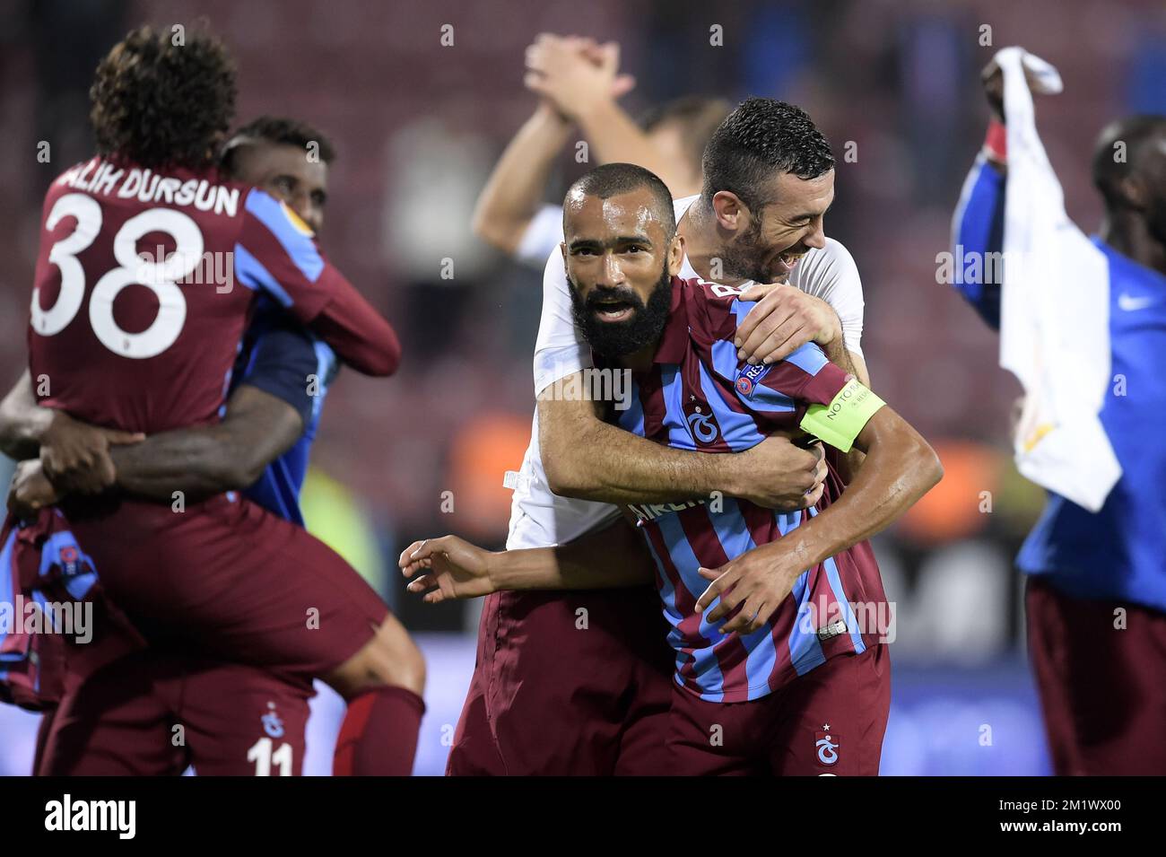 20141023 - TRABZON, TURKEY: Trabzonspor's Jose Bosingwa and Trabzonspor's Essaid Belkalem celebrate after winning a game between Turkish club Trabzonspor AS and Belgian soccer team KSC Lokeren OVL in the Huseyin Avni Aker Stadium in Trabzon, Thursday 23 October 2014. It is the third day of the group stage of the UEFA Europa League competition, in group L. BELGA PHOTO YORICK JANSENS Stock Photo